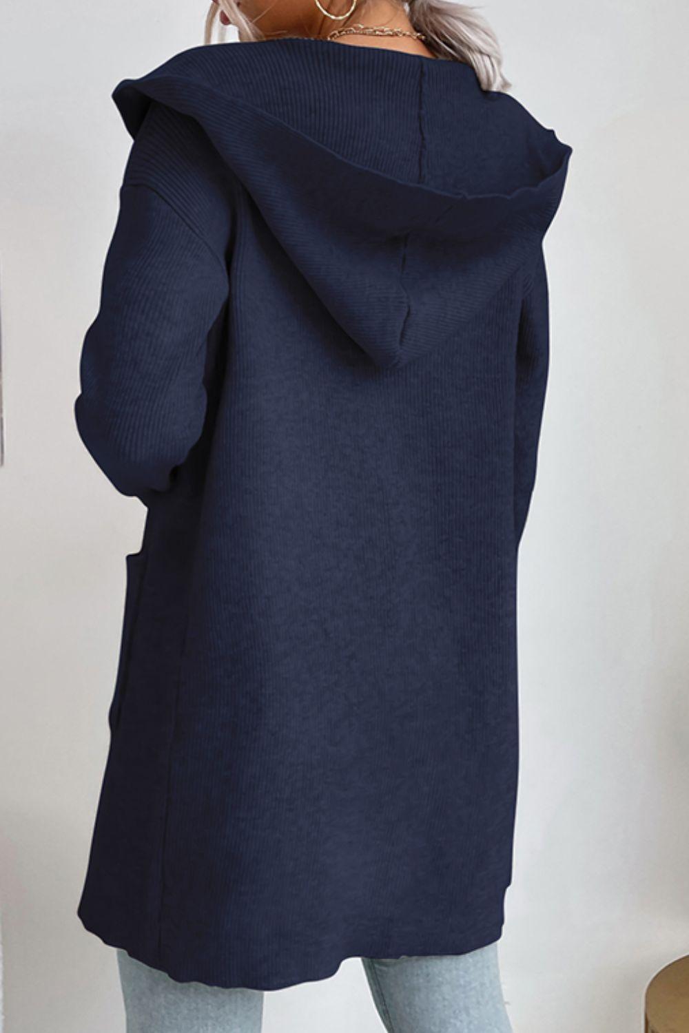 Ribbed long-sleeve hooded cardigan for women, open front design with pockets, ideal for winter warmth.