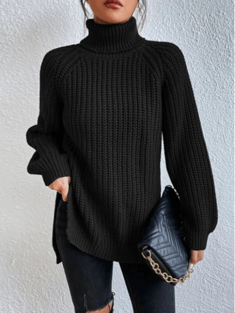 Close-up of a women's ribbed knit turtleneck sweater featuring a trendy split hem, ideal for casual style.