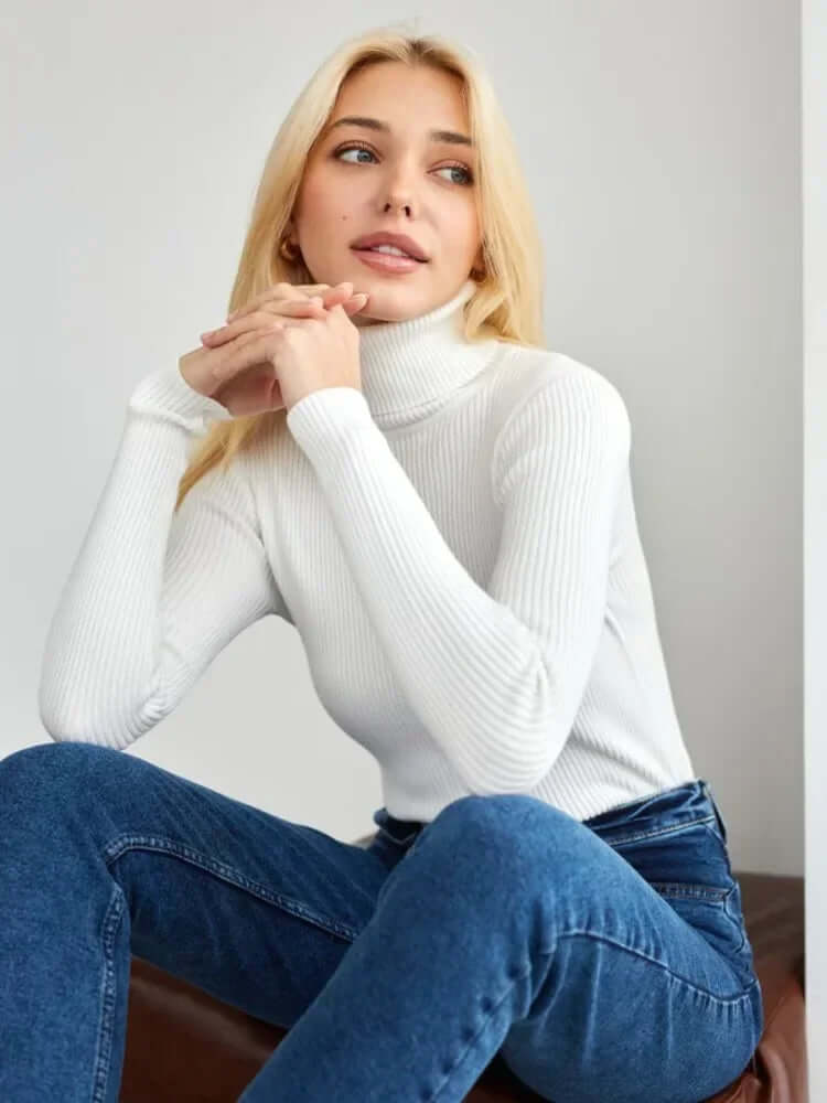 Warm women's knit ribbed pullover sweater, designed with a chic turtleneck for winter fashion.