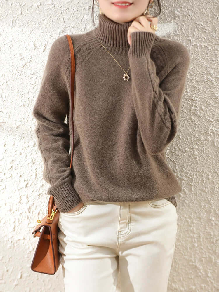 Women's casual roll neck knitted jumper. Warm long sleeve essential for everyday winter style.