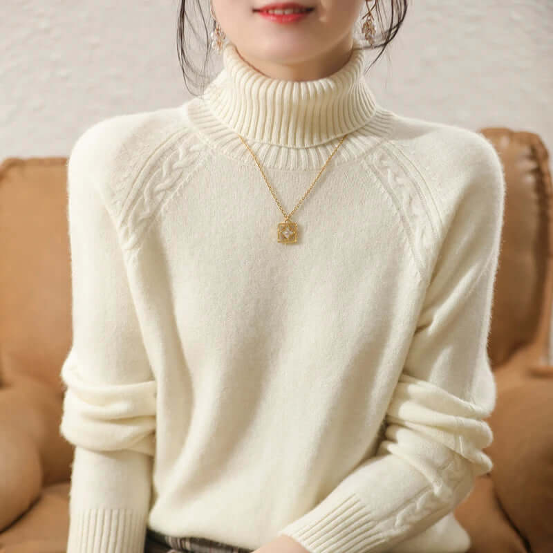 Elegant long sleeve knitted roll neck sweater for women. Soft, cozy winter fashion.