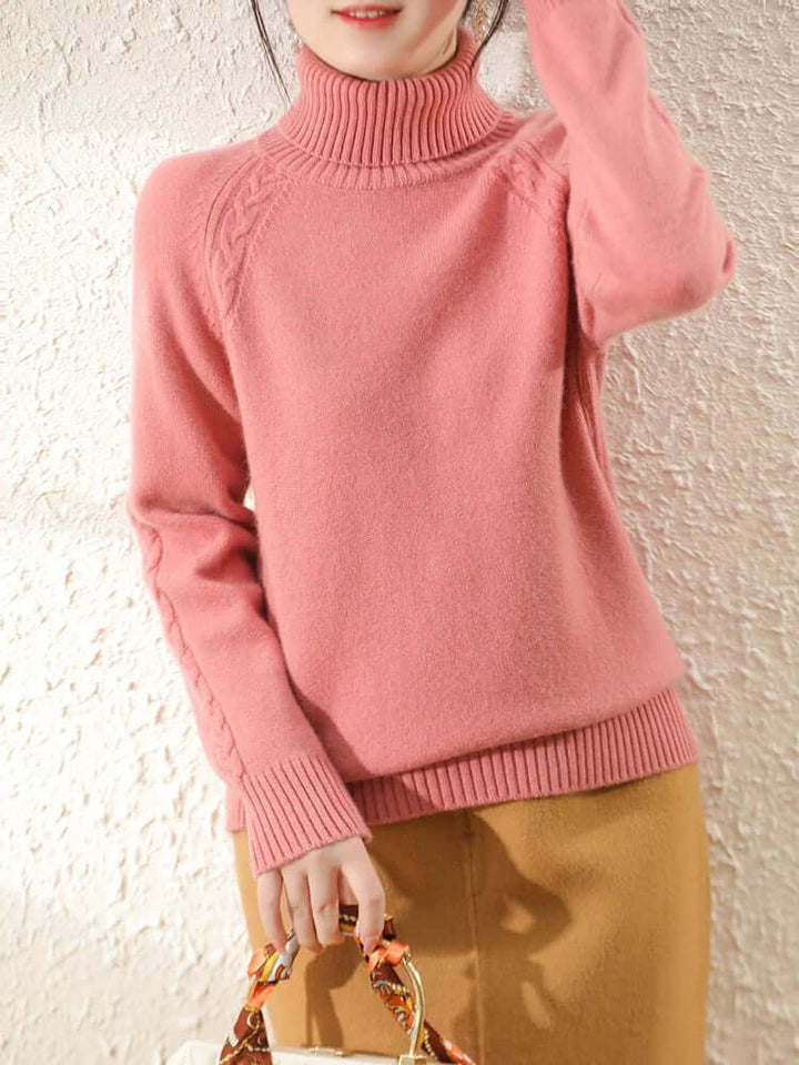 Cozy women's roll neck sweater. Soft knitted apparel, warm and stylish for cold days.