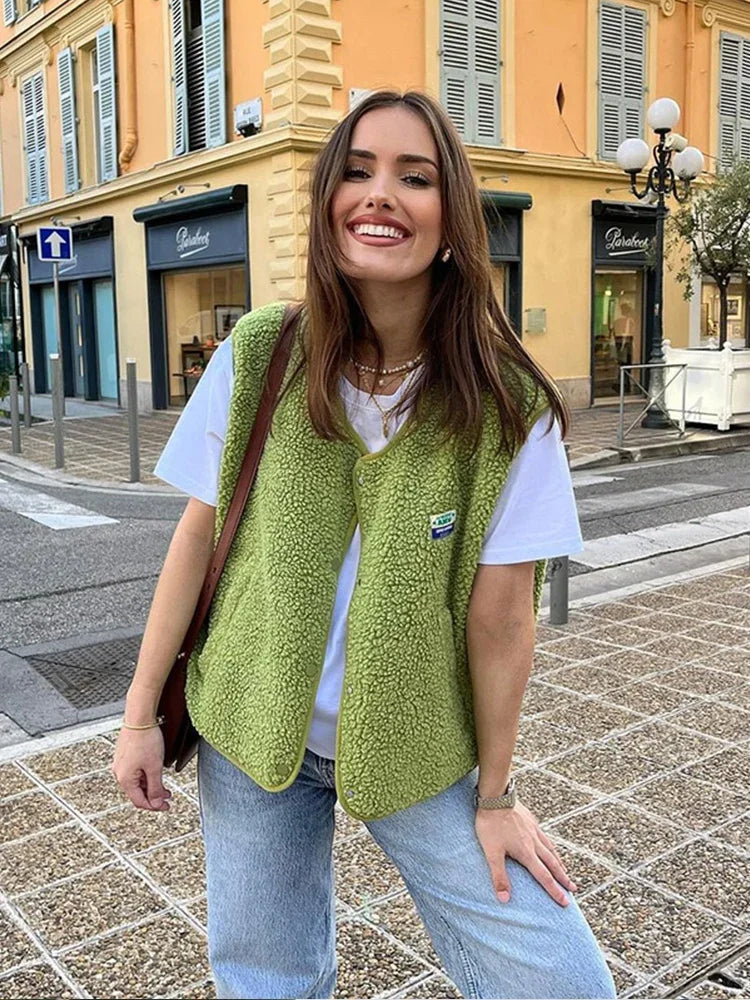 Women's cozy sherpa vest, perfect for casual layering. Soft, open-front design for comfort and modern style.