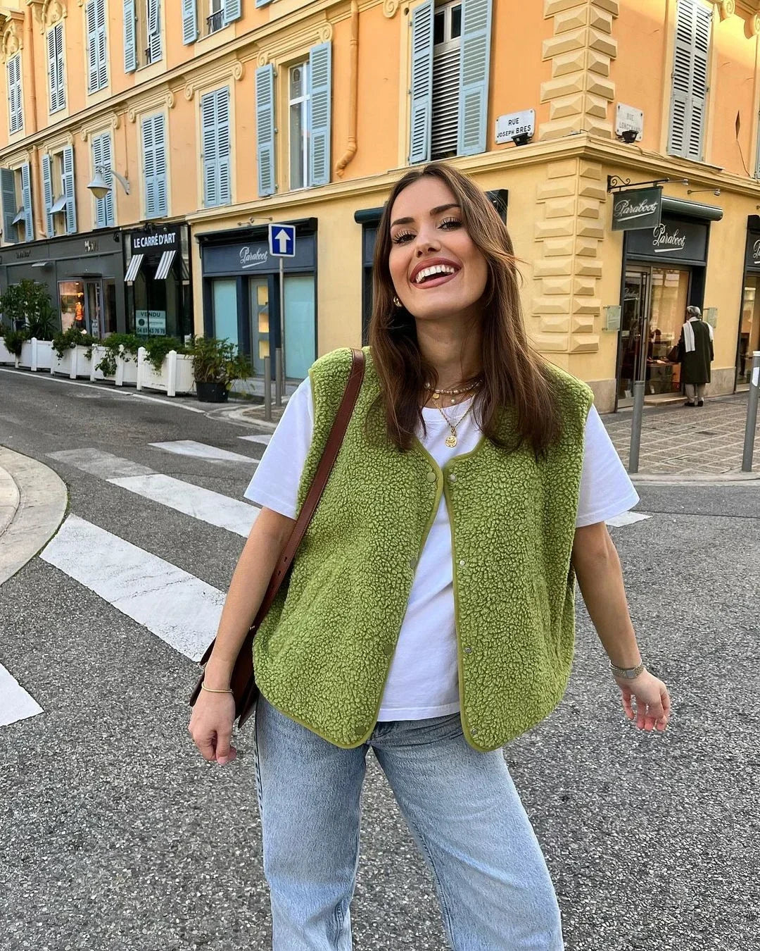 Plush women's sherpa vest, offering cozy comfort and soft texture for everyday wear. Open-front, stylish casual layering.