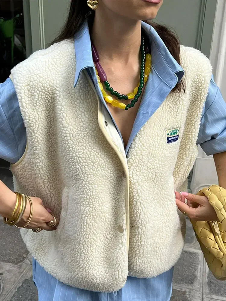 Ultra-soft women's sherpa vest for ultimate comfort and casual layering. Open-front design, perfect for modern seasonal fashion.