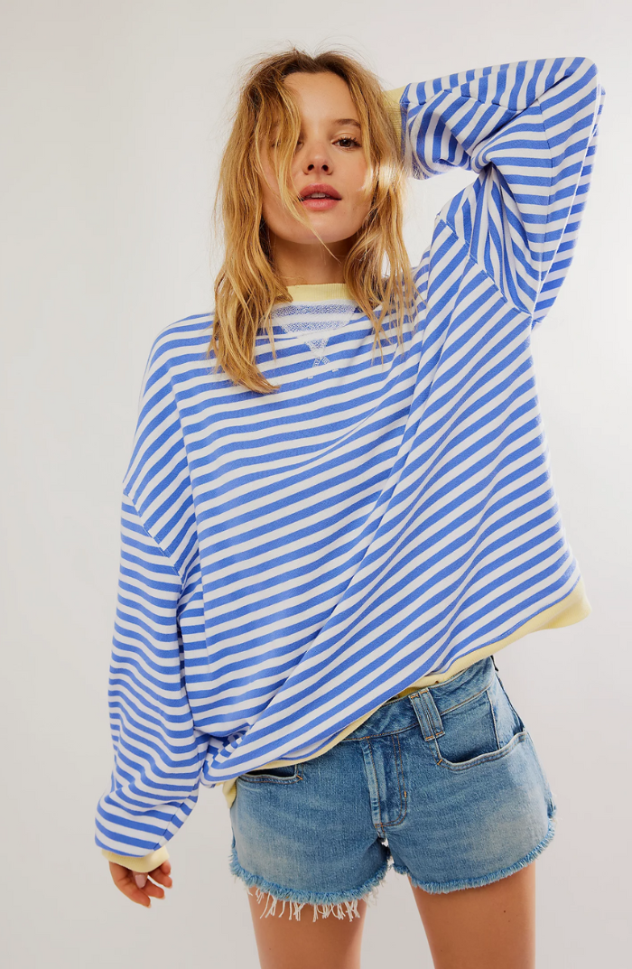 Timeless women's striped crewneck sweater. Crafted from soft knit, a versatile long sleeve for cozy winter outfits.