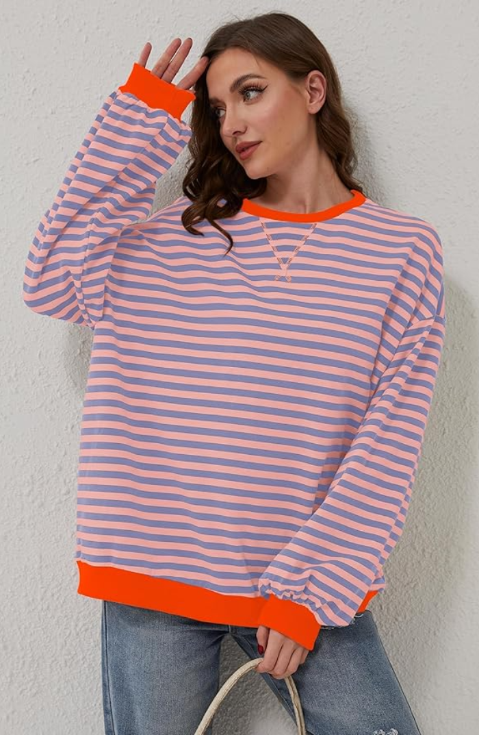 Classic striped knit crewneck sweater for women. A comfortable and stylish long sleeve cozy top for daily wear.