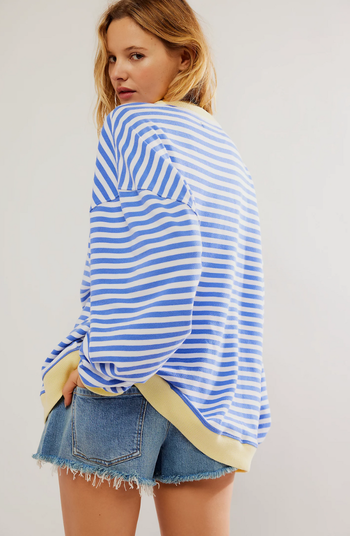 Elegant women's striped crewneck sweater. Knit for comfort, this cozy long sleeve top is perfect for winter wear.