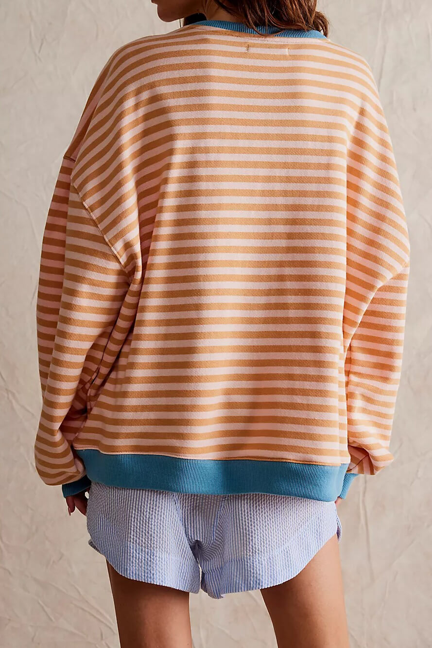 Stylish women's striped sweater with a comfortable crewneck. A cozy long sleeve knit ideal for fall fashion.