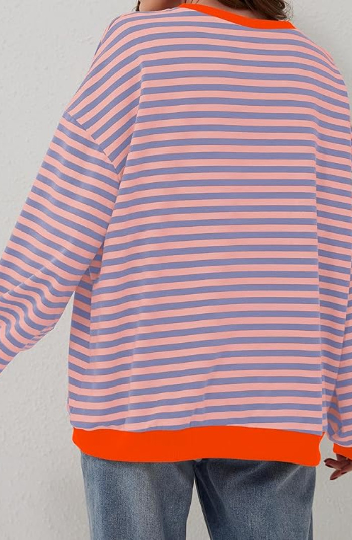 Women's casual striped crewneck sweater. This cozy knitwear offers warmth and timeless style for any occasion.