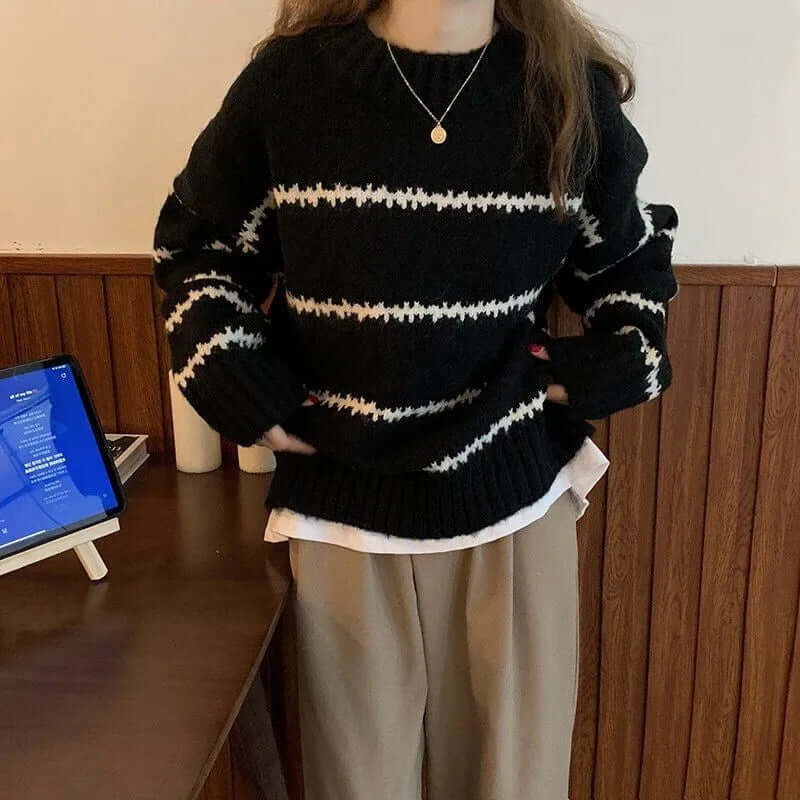 Stylish women's striped knit sweater with round neck, soft & cozy for casual fall and winter wear.