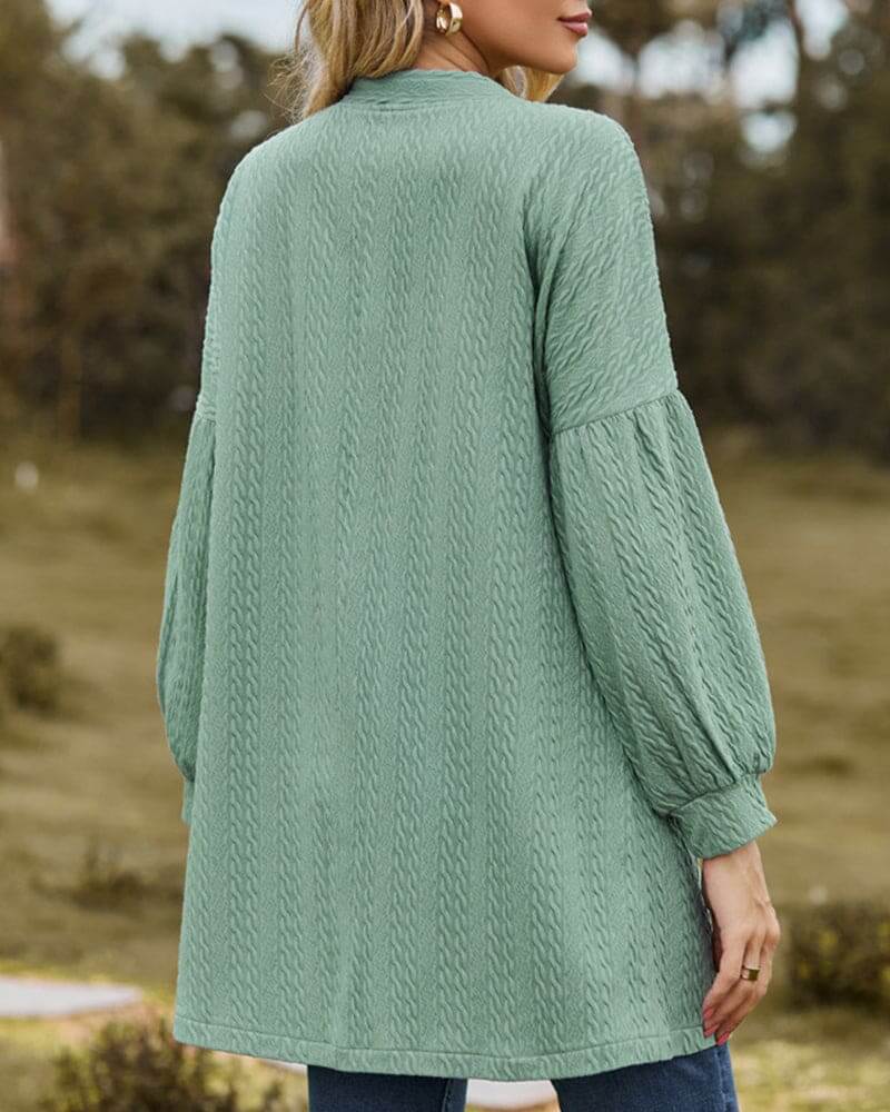 Stylish women's long sleeve cardigan, featuring a cozy texture & lantern sleeves for elegant fall/winter layering.