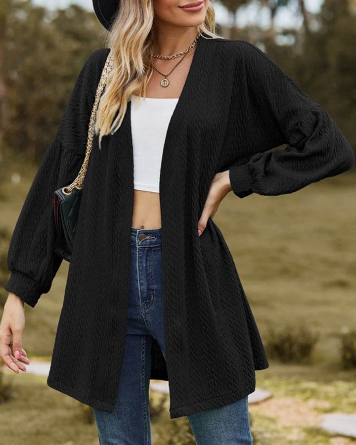 Elegant women's textured knit cardigan with stylish lantern sleeves, perfect for cozy and fashionable layering.