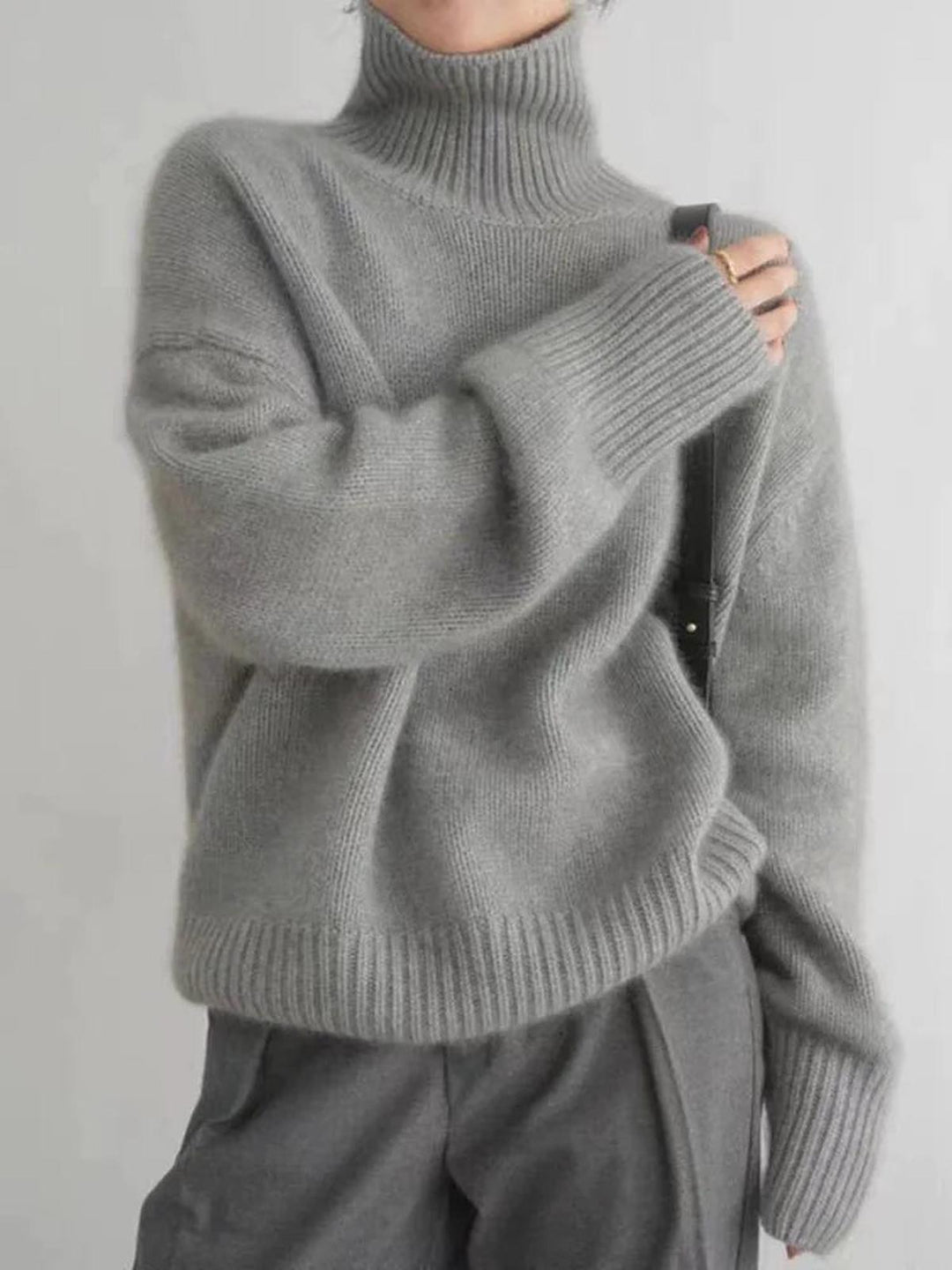 Stylish gray women's turtleneck sweater, a versatile long sleeve pullover for fall & winter fashion.