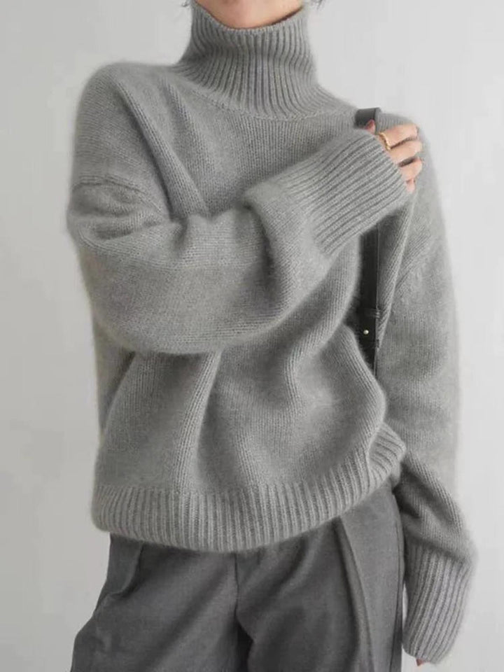 Stylish gray women's turtleneck sweater, a versatile long sleeve pullover for fall & winter fashion.