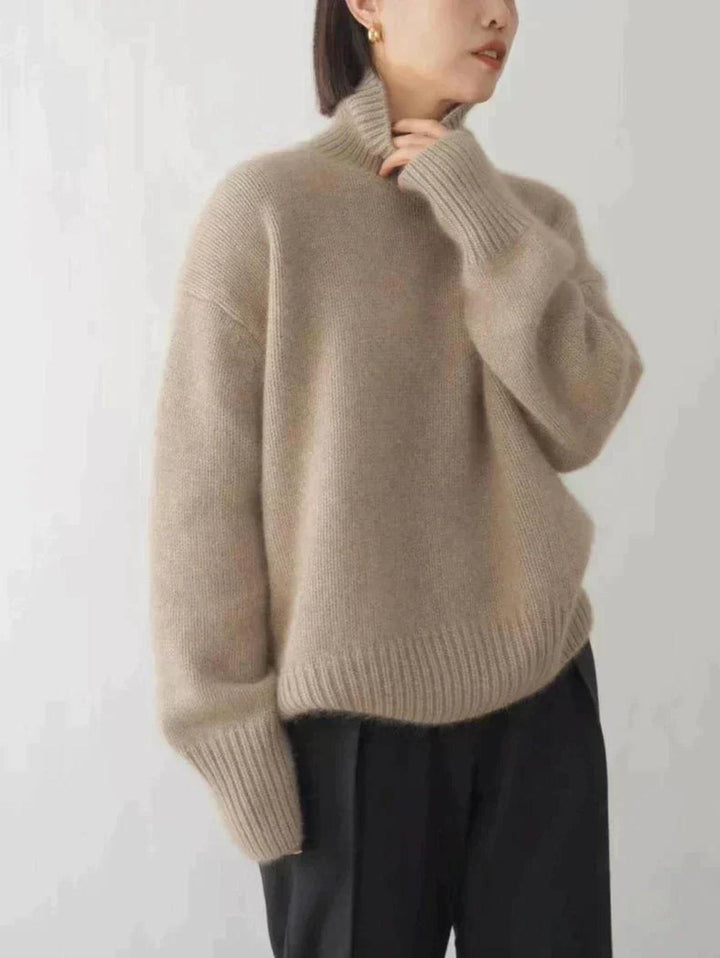 Women's casual chic long sleeve turtleneck sweater, providing warmth and style for fall and winter.