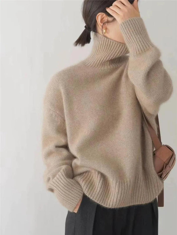 Comfortable women's pullover turtleneck sweater, a must-have cozy long sleeve for cold weather fashion.