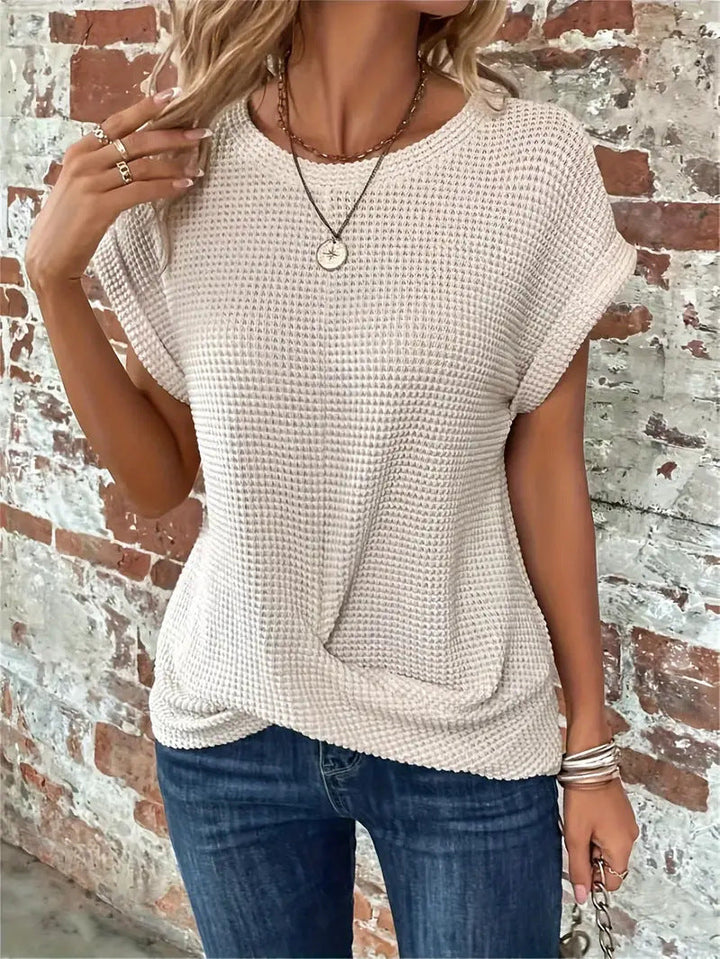 Relaxed fit women's waffle knit top. Cozy, breathable long sleeve tee in a solid color for ultimate comfort.