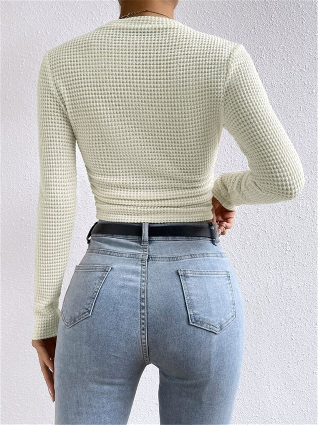 Soft waffle knit women's long sleeve top. Ideal casual wear for fall and winter comfort.