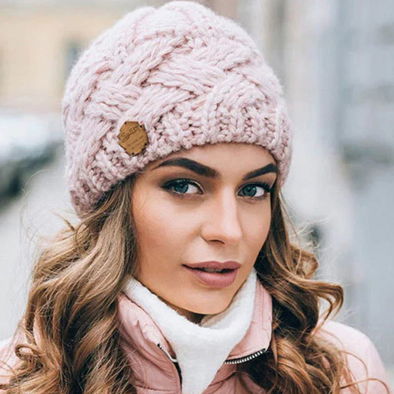Comfortable women's knitted winter hat, providing cozy warmth and a stylish look for cold weather.