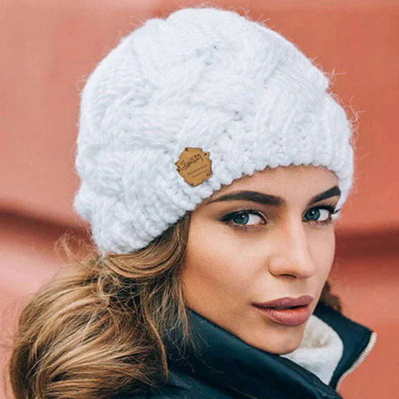 Elegant women's warm knitted hat, a cozy and stylish winter fashion accessory for ultimate cold protection.