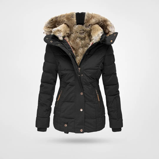 Women's cozy waterproof winter jacket with hood for ultimate warmth & dryness in cold weather.