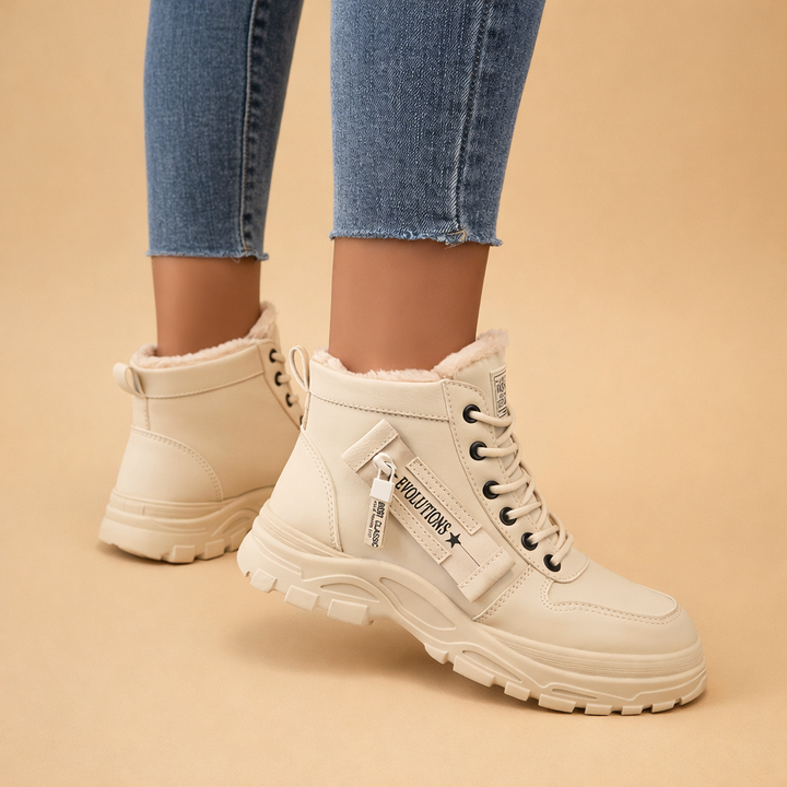 Cozy women's cold weather boots with plush warmth. Slip-resistant outdoor footwear, perfect for durable winter wear.