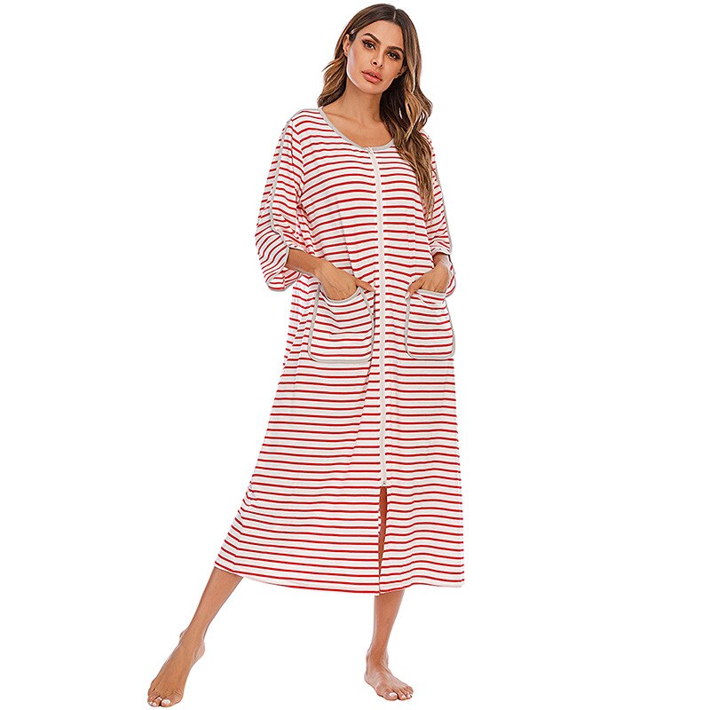 Warm women's mid-length hooded nightdress, full zip & pockets for cozy winter evenings.