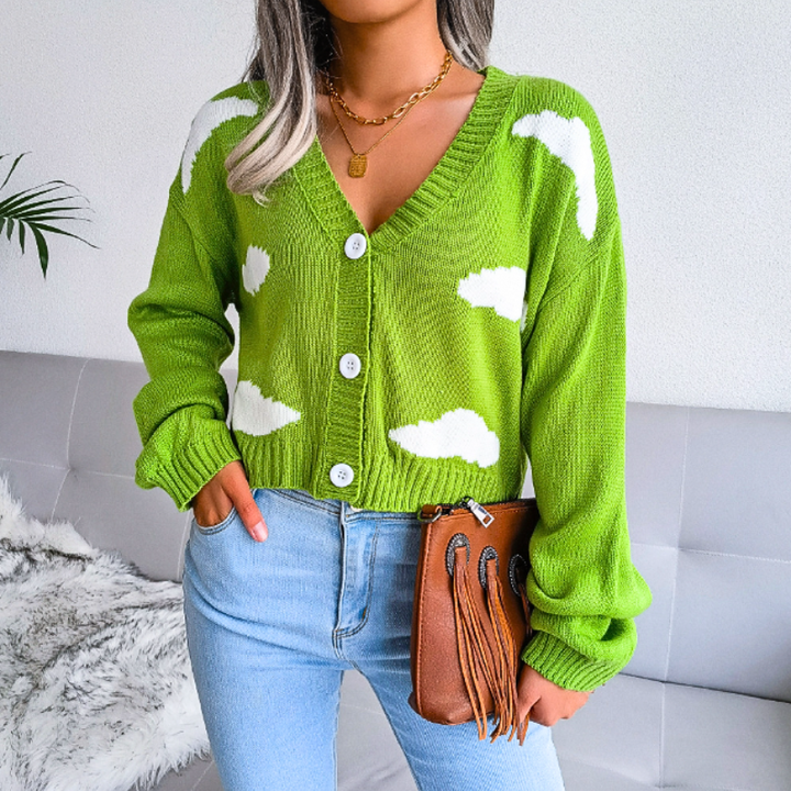 Green women's cropped cloud print cardigan. Comfortable V-neck layering top for fall outfits.
