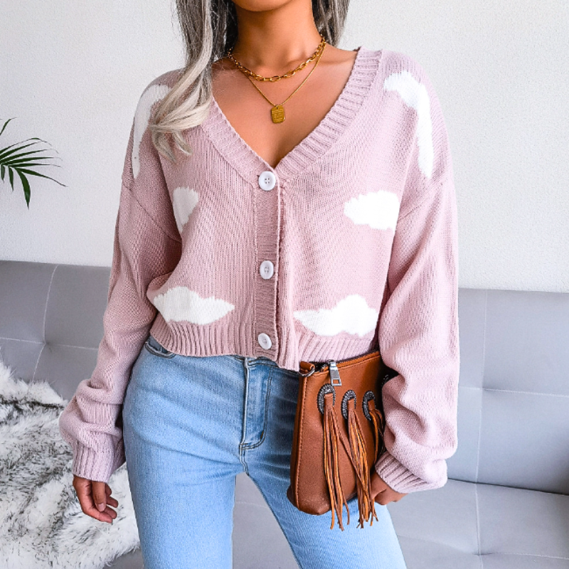 Comfortable cloud print cropped cardigan for women. V-neck, button-up, unique design.