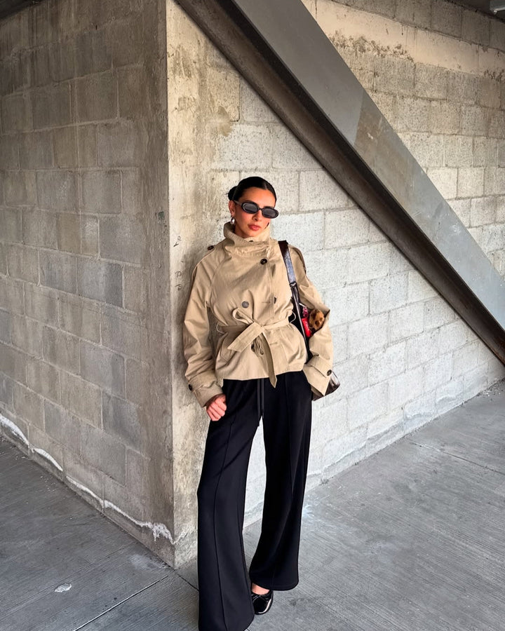 Women's cropped trench coat, double-breasted and belted style, perfect fall outerwear.