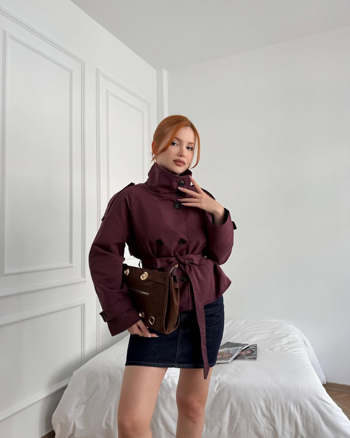 Timeless women's cropped trench coat, classic double-breasted belted design, elegant.