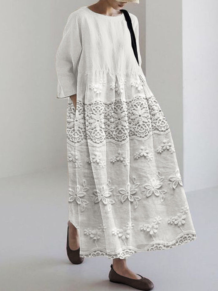 Women's delicate floral midi dress, perfect for spring/summer, with a flowy fit and elegant print.