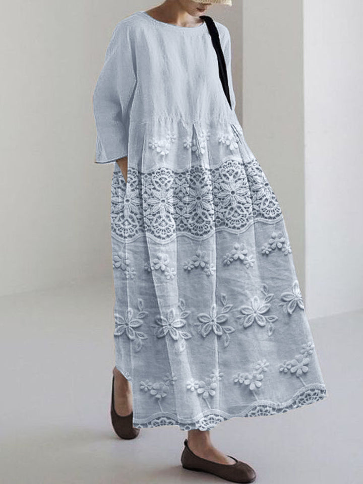 Comfortable women's floral midi dress, ideal for casual everyday wear or elegant spring occasions. Relaxed fit.