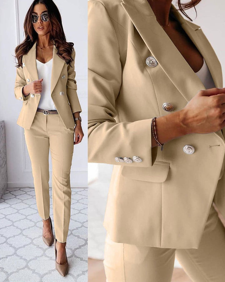 Elegant women's power suit featuring a tailored blazer and matching pants for office fashion.