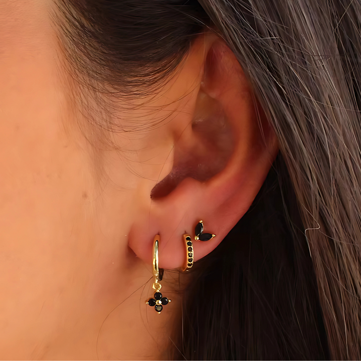 Comfortable women's ear piercing set, hypoallergenic surgical steel earrings, studs & hoops for effortless style.
