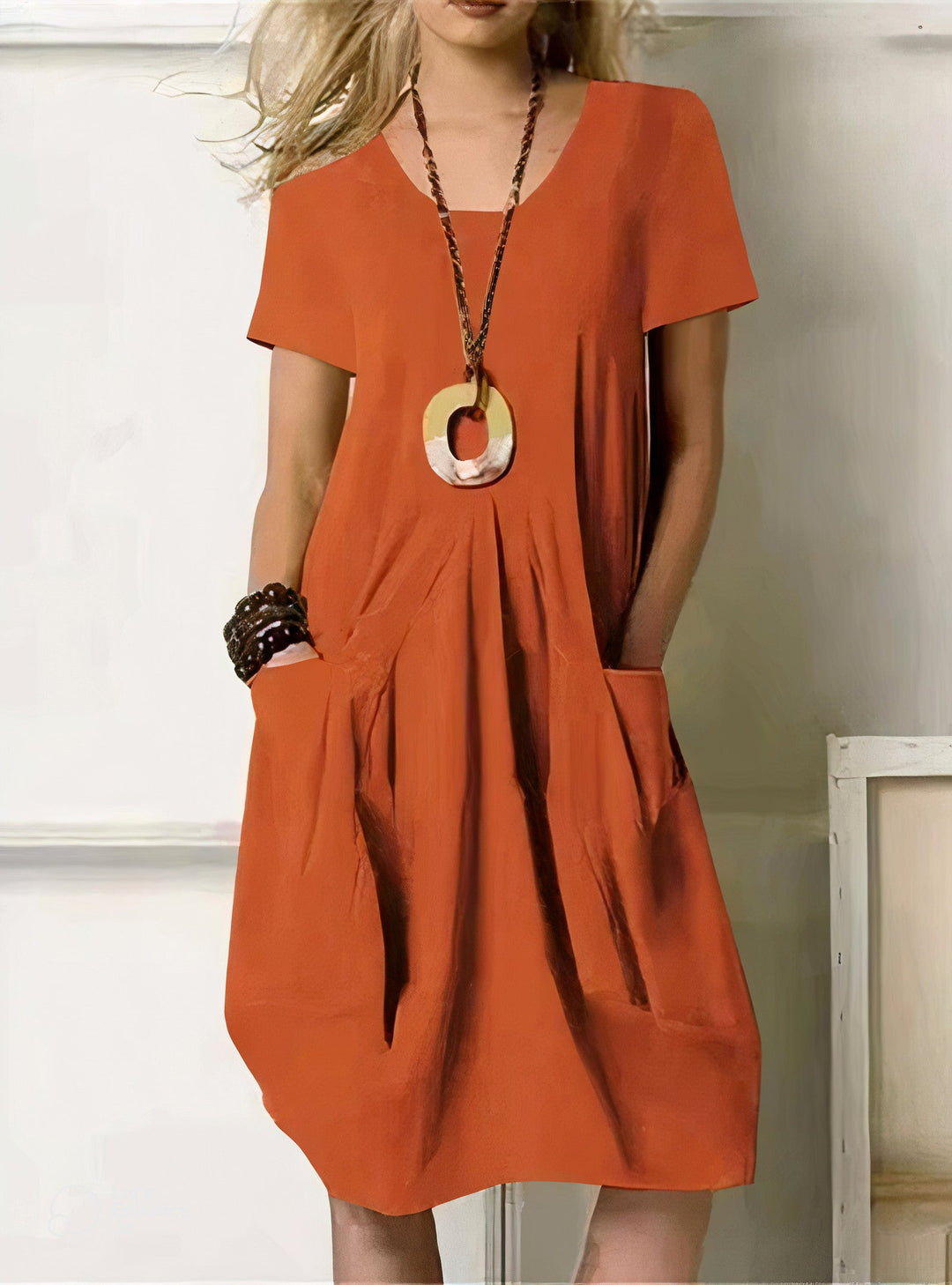 Effortless women's casual swing dress, offering a relaxed & flattering fit for comfortable daily wear. Great for summer.