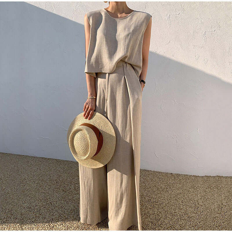Women's Effortless Chic sleeveless top & wide-leg trousers set, perfect for elegant casual wear.