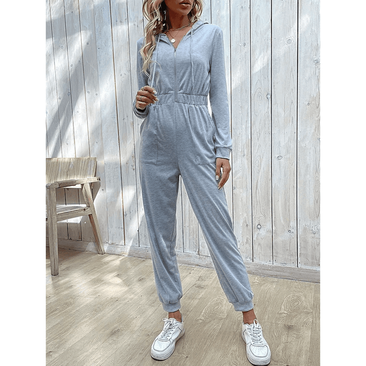 Comfortable women's full-length hooded jumpsuit. Versatile slim-fit polyester loungewear with zipper.