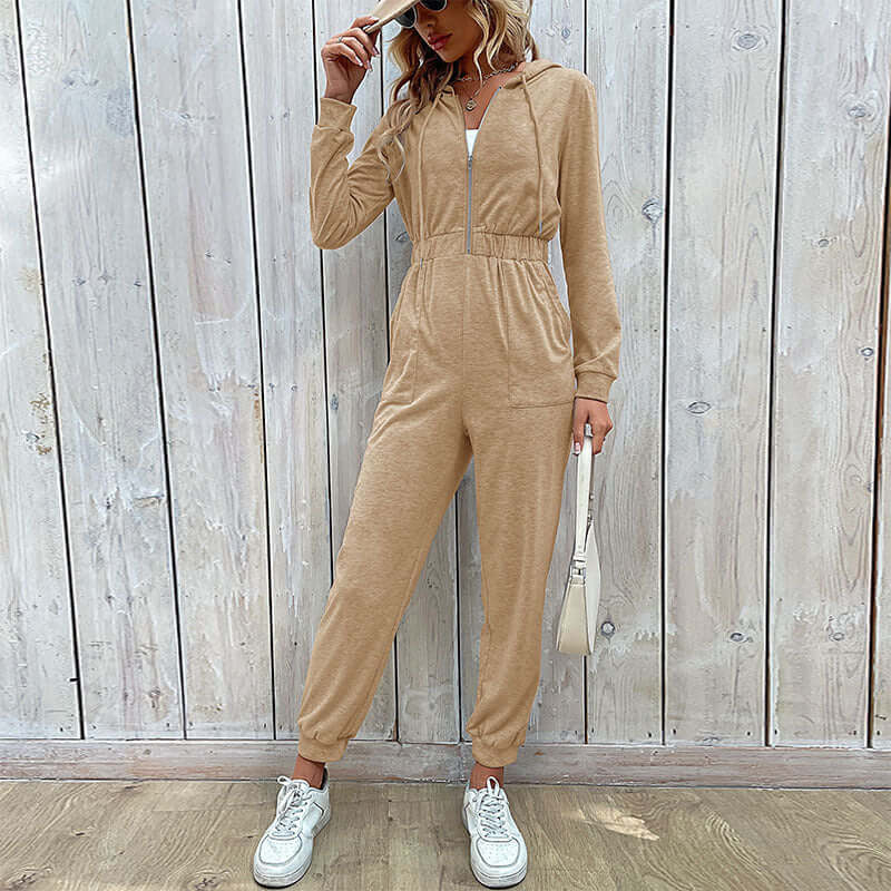 Effortless women's hooded slim-fit jumpsuit, a comfortable polyester full-length piece for everyday loungewear.