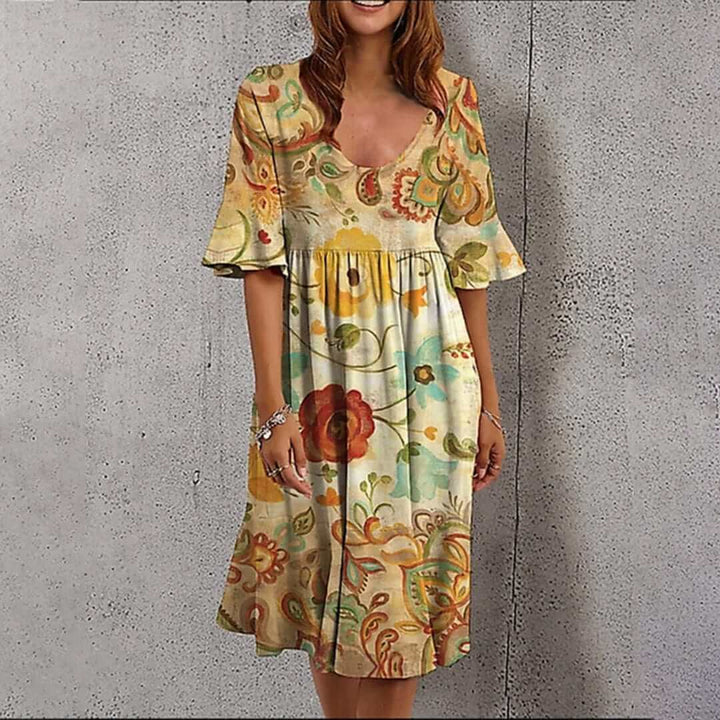 Women's effortless floral summer midi dress, perfect for casual outings or elegant vacation wear.