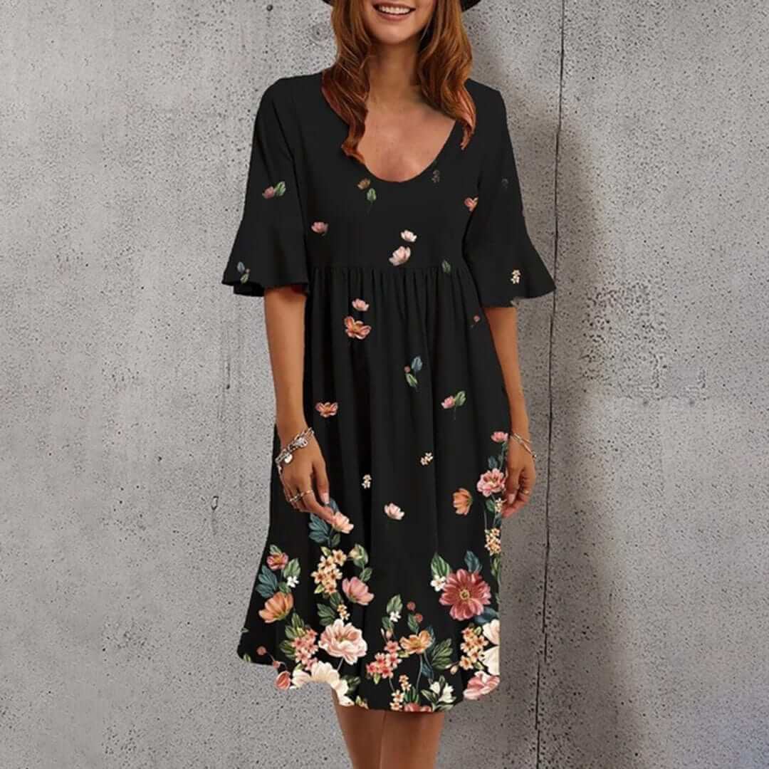 Flowy polyester floral midi dress for women with a flattering v-neck, ideal for summer beach days.