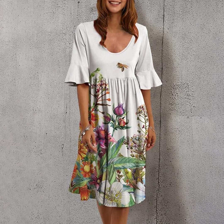 Casual yet elegant women's floral summer midi dress, a breathable polyester design for warm weather.