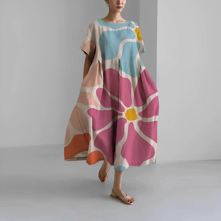 Women's effortless floral swing dress, perfect for casual comfort & everyday summer wear.