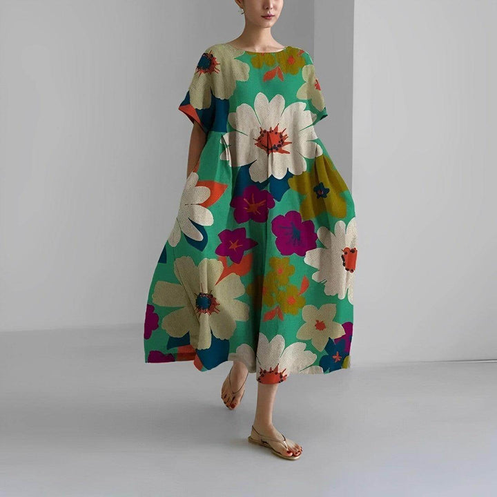 Vibrant floral swing dress for women, a loose and comfortable choice for casual summer fashion.