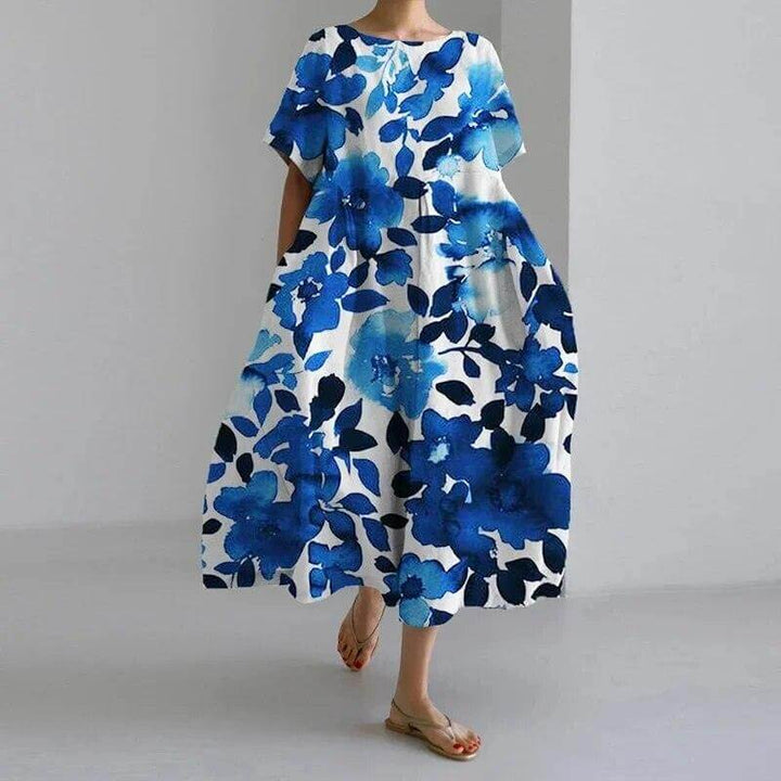 Women's floral swing dress, a comfortable and stylish casual dress for warm weather & relaxation.