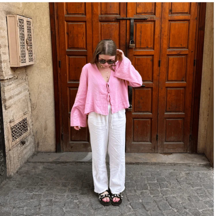 Stylish front-tie crop blouse for women, offering a relaxed and breezy summer fit.