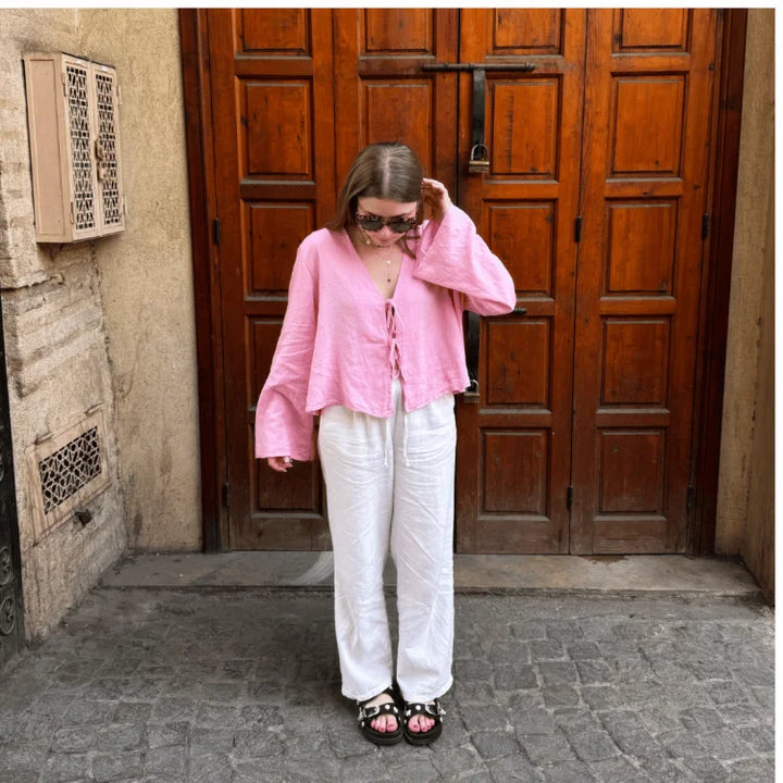 Stylish front-tie crop blouse for women, offering a relaxed and breezy summer fit.