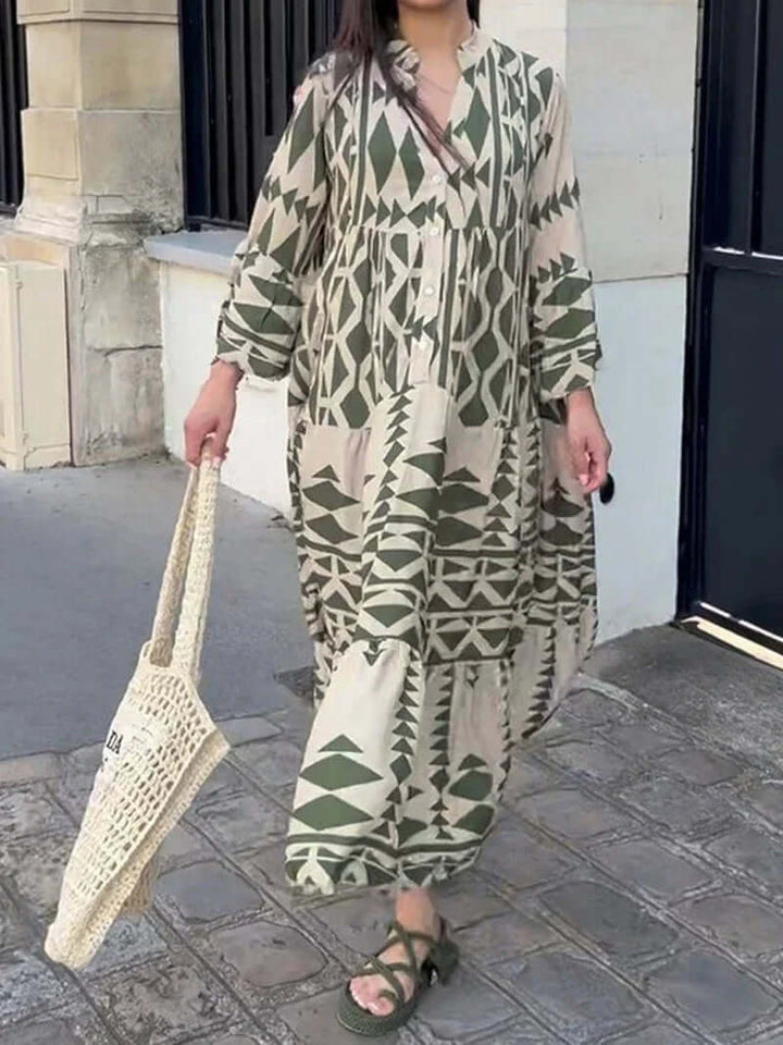 Women's V-neck geometric maxi dress, styled casually for a chic summer day out.