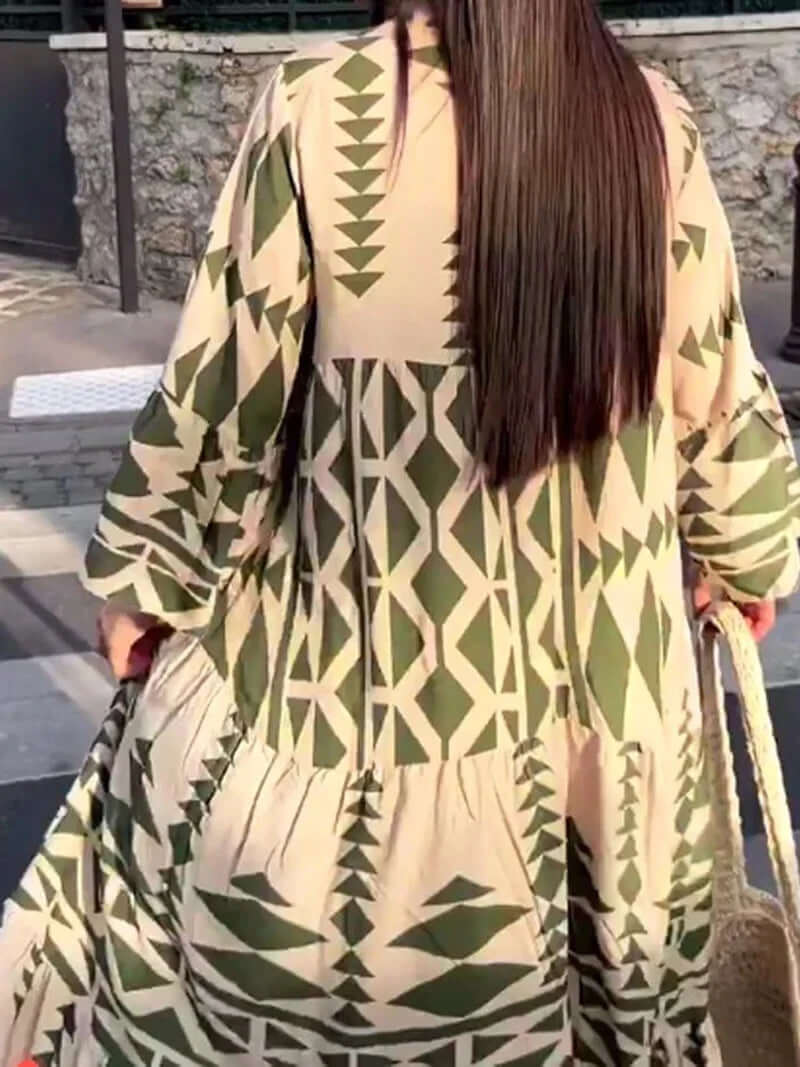 Comfortable polyester geometric print maxi dress for women, featuring a stylish V-neck design.